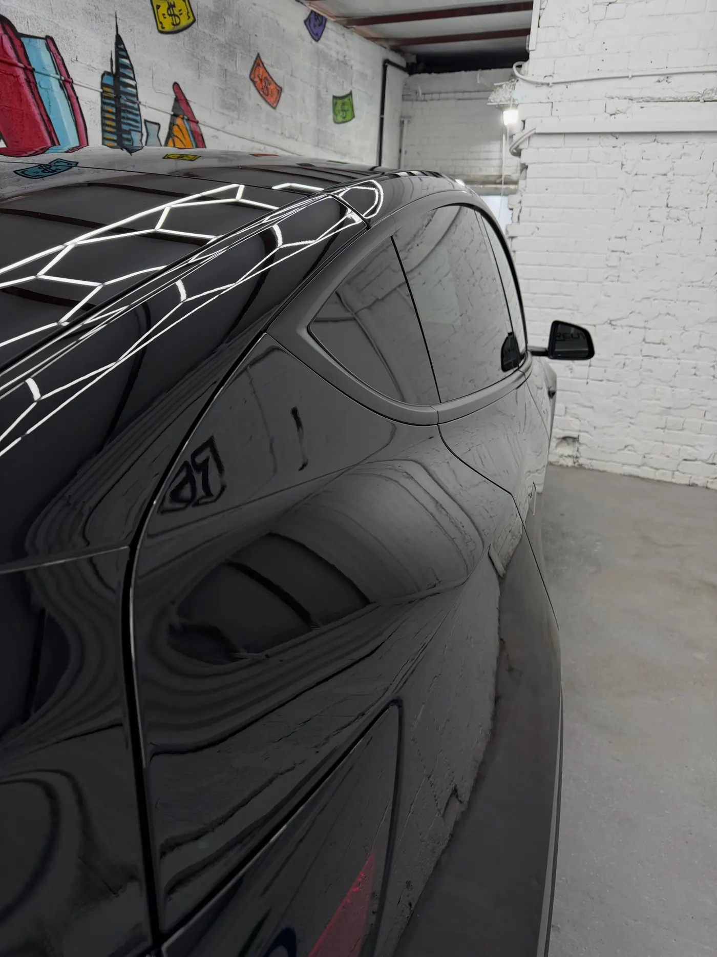 Tesla Model Y בסדנת Reuvens — צילום מקורי 6 מתוך 6